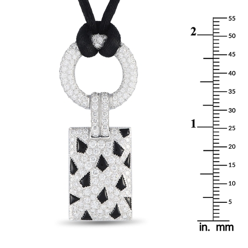 60 - An Cartier Panthere 18K White Gold 2.85ct Diamond and Onyx Pendant Necklace. Total weight of 2.85 ca... 