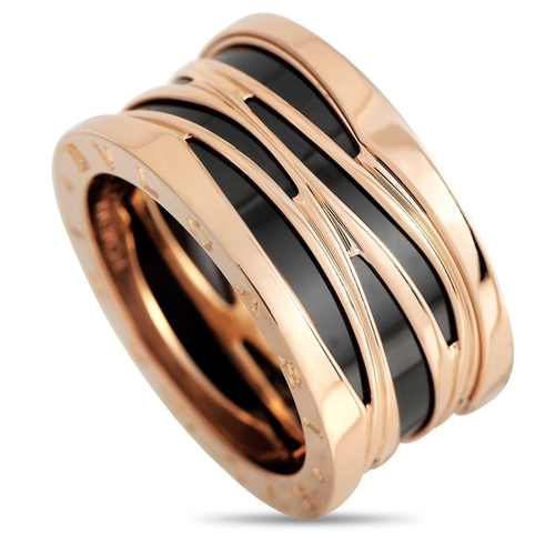 664 - A Bvlgari B.zero1 18K Rose Gold Ceramic Band Ring. Black ceramic accents. Crafted from opulent 18K r... 