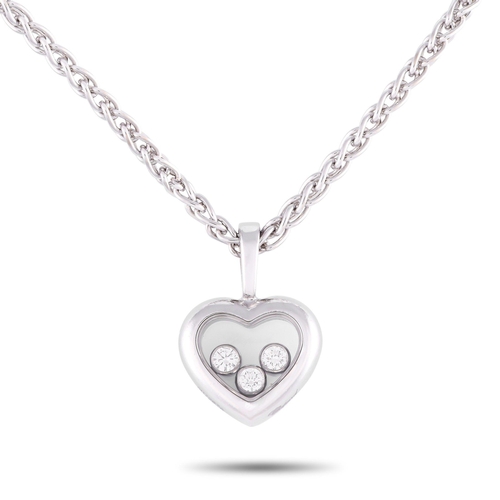 678 - A Chopard Happy Diamonds 18K White Gold Diamond Heart Necklace. It features a heart-shaped white gol... 