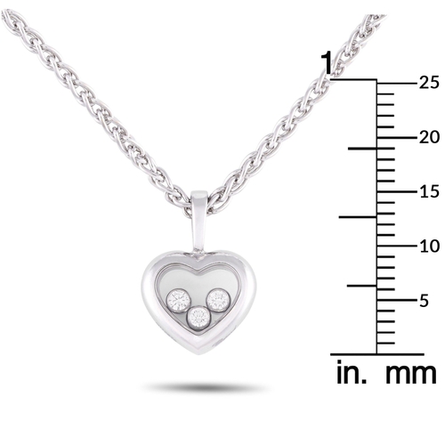 678 - A Chopard Happy Diamonds 18K White Gold Diamond Heart Necklace. It features a heart-shaped white gol... 