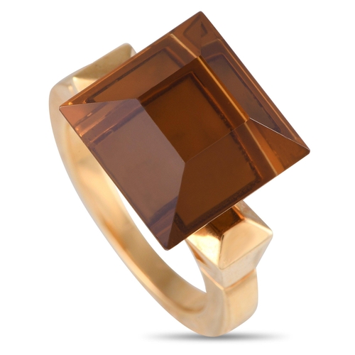 918 - A Gucci Chiodo 18K Yellow Gold Citrine Ring. Set high above the band is an oversized step-cut citrin... 