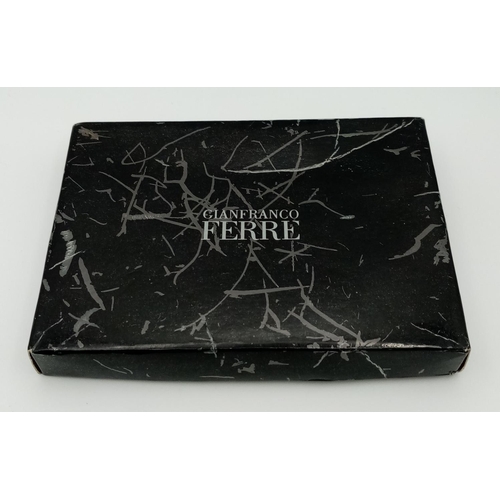 947 - A Gianfranco Ferre Card Wallet. Comes with box. Approximately 11cm length x 7.5cm height.