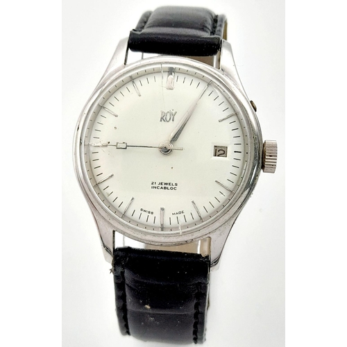 954 - An Early Swiss Made Roy Watch. 35mm case. White dial with date box. Black leather strap (could do wi... 