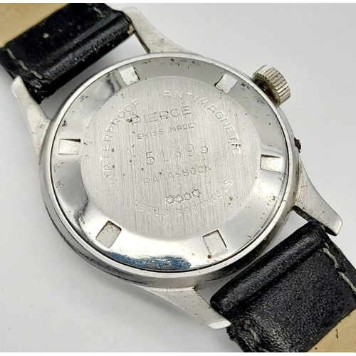 954 - An Early Swiss Made Roy Watch. 35mm case. White dial with date box. Black leather strap (could do wi... 