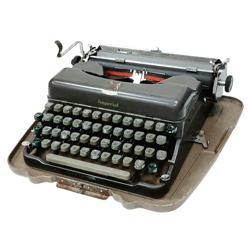 1309 - A vintage 1950's Imperial Good Companion 3 typewriter. Complete with it's outer case. In good condit... 