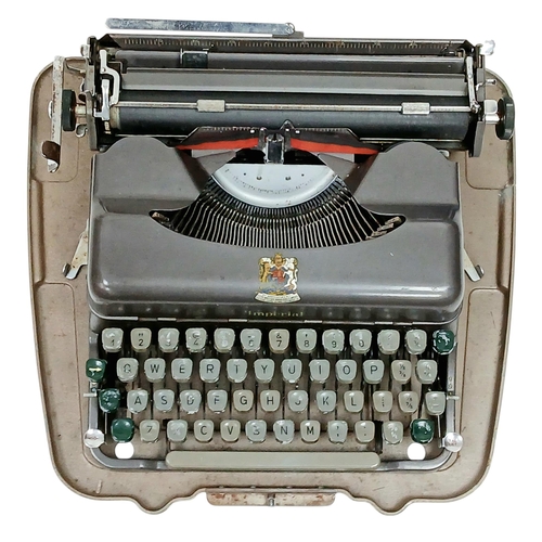 1309 - A vintage 1950's Imperial Good Companion 3 typewriter. Complete with it's outer case. In good condit... 