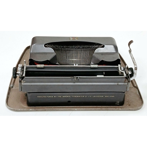 1309 - A vintage 1950's Imperial Good Companion 3 typewriter. Complete with it's outer case. In good condit... 