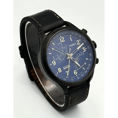 1175 - A Timex Intelligent Quartz Gents Watch. Black leather strap. Ceramic and steel case - 45mm. Blue dia... 