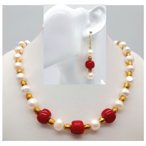 258 - A marvellous necklace and earrings set with large (10 mm) white natural cultured pearls and red cora... 