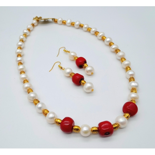 258 - A marvellous necklace and earrings set with large (10 mm) white natural cultured pearls and red cora... 