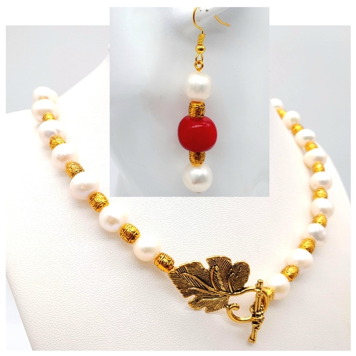 258 - A marvellous necklace and earrings set with large (10 mm) white natural cultured pearls and red cora... 