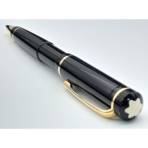 572 - A Montblanc Anniversary Edition Twist Ballpoint Pen - 1906 -2006. Black resin and gilded decoration.... 