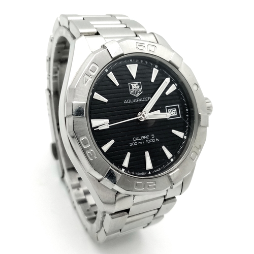 139 - A Tag Heuer Aquaracer Calibre 5 Automatic Gents Watch. Model - Way2110. Stainless steel bracelet and... 