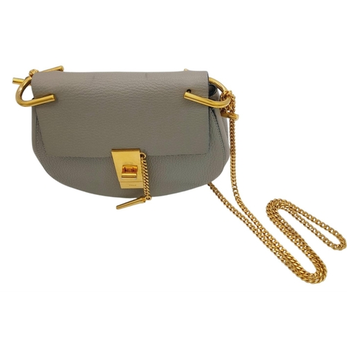 146 - A Chloé Drew Shoulder Bag. Grained grey leather exterior with gold-toned hardware, chain shoulder st... 