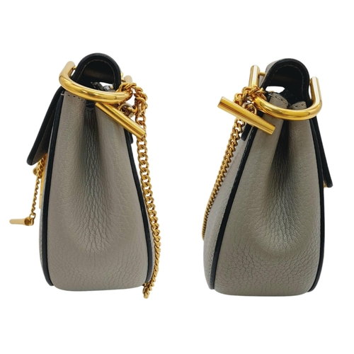 146 - A Chloé Drew Shoulder Bag. Grained grey leather exterior with gold-toned hardware, chain shoulder st... 