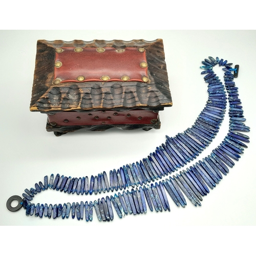 181 - A majestic, lapis lazuli, two strand necklace of pharaonic proportions, carrying needle-like long be... 