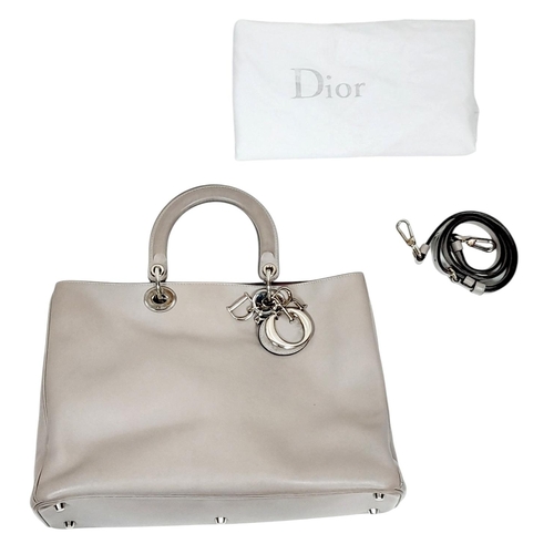 229 - A Christian Dior Grey Leather Diorissimo Tote Bag. Grey leather exterior with silver-toned hardware,... 