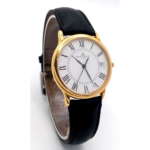 236 - An 18K Gold Cased Baume and Mercier Quartz Gents Watch. 
Black leather strap. 18k gold case - 34mm. ... 