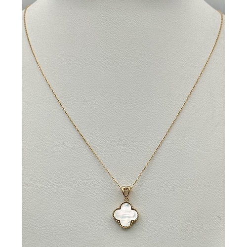 267 - An 18K Gold and  Mother of Pearl Pendant on an 18K Gold Disappearing Necklace. 2cm and 44cm. 2.95g