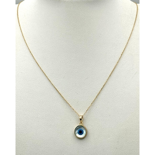 288 - An 18K Yellow Gold and Enamel Evil Eye Pendant on an 18K Yellow Gold Disappearing Necklace. 15mm and... 