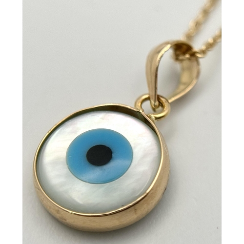 288 - An 18K Yellow Gold and Enamel Evil Eye Pendant on an 18K Yellow Gold Disappearing Necklace. 15mm and... 