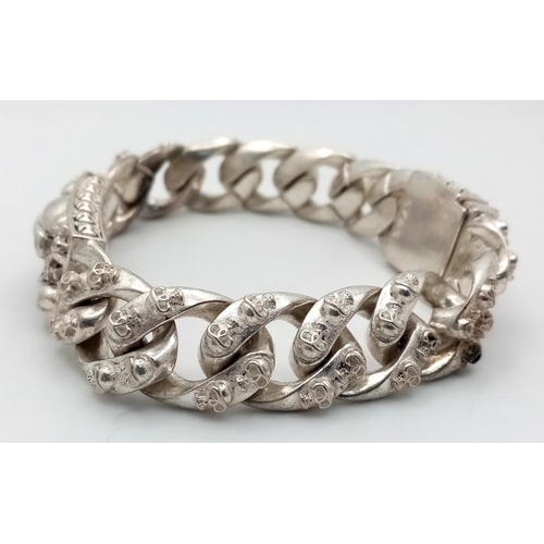 293 - Of Buddhist interest: A Tibetan silver, gents’ bracelet with sculls. Length: 23 cm, weight: 114 g. I... 