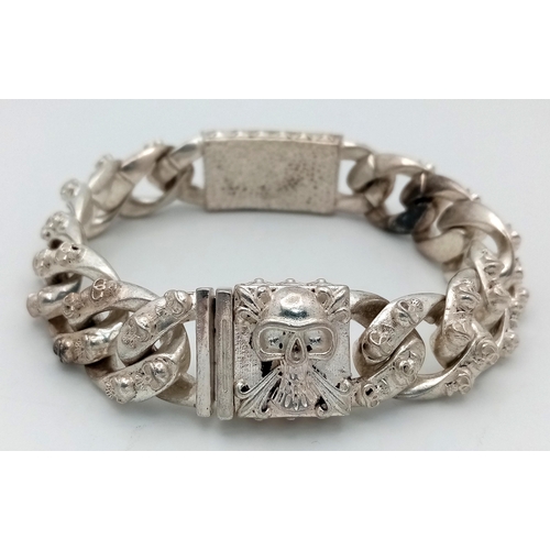 293 - Of Buddhist interest: A Tibetan silver, gents’ bracelet with sculls. Length: 23 cm, weight: 114 g. I... 