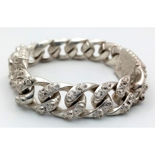 293 - Of Buddhist interest: A Tibetan silver, gents’ bracelet with sculls. Length: 23 cm, weight: 114 g. I... 