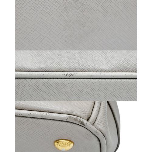 314 - A Prada Grey Saffiano Leather Double Tote Bag. Grey saffiano leather exterior with gold-toned hardwa... 