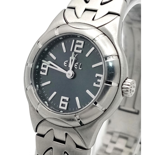 335 - An Ebel Type E Quartz Ladies Watch. Stainless steel bracelet and case - 26mm. Dark grey dial. In wor... 