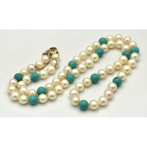 344 - A Turquoise and Cultured Pearl Beaded Necklace. Gold filled and 9k clasp. 44cm