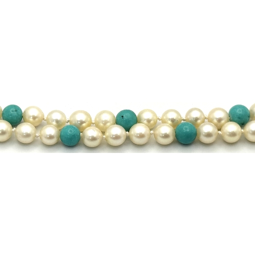 344 - A Turquoise and Cultured Pearl Beaded Necklace. Gold filled and 9k clasp. 44cm