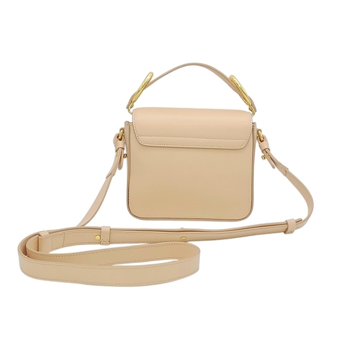 476 - A Chloé Pink C Crossbody Bag. Pink calf leather exterior with a beige suede panel near the gold-tone... 