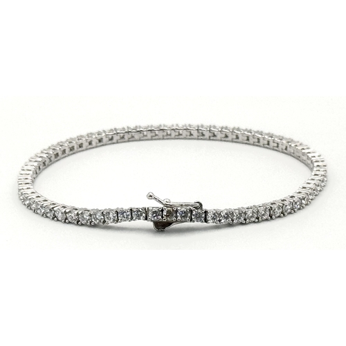 533 - A 925 Silver and White Stone Tennis Bracelet. 18cm