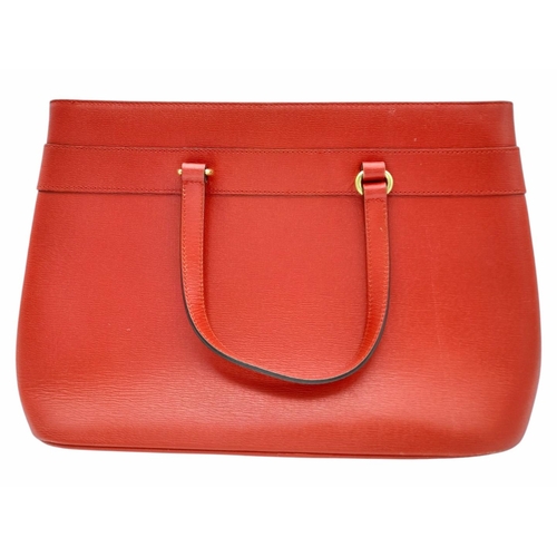 545 - A Gucci Red Leather Horsebit Top Handle Bag. Red leather exterior with gold-toned hardware and dual ... 