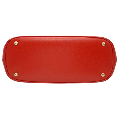 545 - A Gucci Red Leather Horsebit Top Handle Bag. Red leather exterior with gold-toned hardware and dual ... 