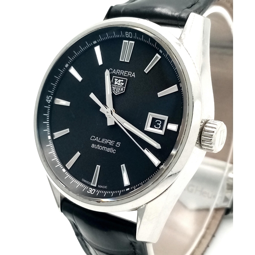 90 - A Tag Heuer Carrera Automatic Gents Watch. Model - WAR211A-1. Black leather strap. Stainless steel c... 