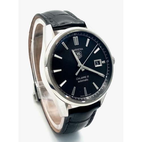 90 - A Tag Heuer Carrera Automatic Gents Watch. Model - WAR211A-1. Black leather strap. Stainless steel c... 