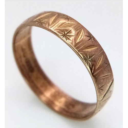 1286 - A Vintage 9K Yellow Gold Band Ring. Geometric pattern design. Size N. 1.9g weight.