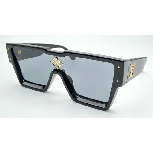 125 - A Pair of Louis Vuitton Cyclone Sunglasses. Black acetate frame, monogram flower signature with four... 