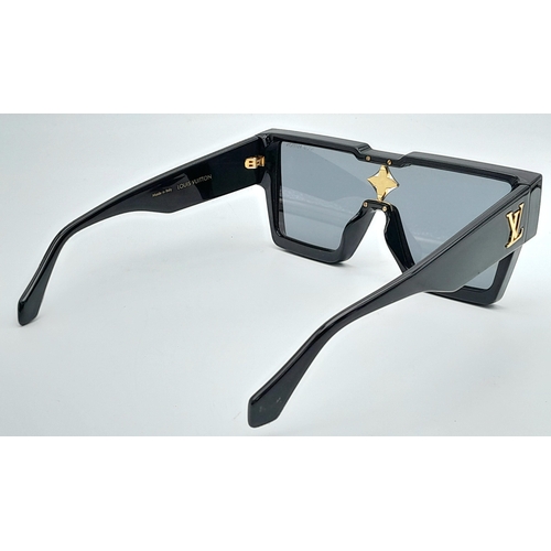 125 - A Pair of Louis Vuitton Cyclone Sunglasses. Black acetate frame, monogram flower signature with four... 