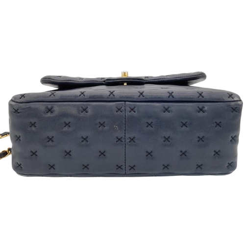 201 - A Chanel Lambskin Cross Stitch Coco Handle Flap Bag. Dark blue lambskin leather exterior with X-patt... 