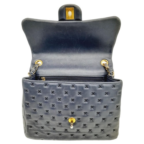 201 - A Chanel Lambskin Cross Stitch Coco Handle Flap Bag. Dark blue lambskin leather exterior with X-patt... 