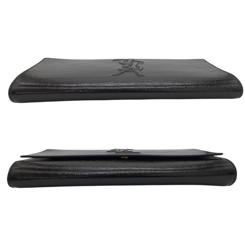 243 - A Saint Laurent Belle De Jour Clutch Bag. Black textured patent leather exterior featuring the class... 