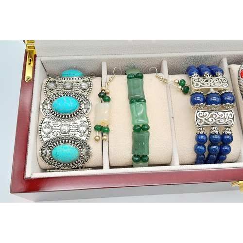 272 - A beautiful wooden exhibition box for watches/bracelets currently loaded with six vintage bracelets ... 