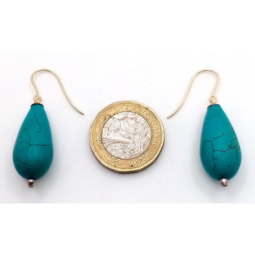 274 - A Pair of Turquoise Pear-Drop Earrings. 9K Gold Hooks. 3cm