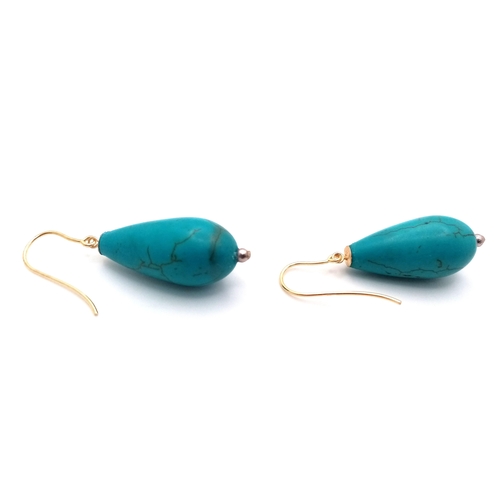 274 - A Pair of Turquoise Pear-Drop Earrings. 9K Gold Hooks. 3cm