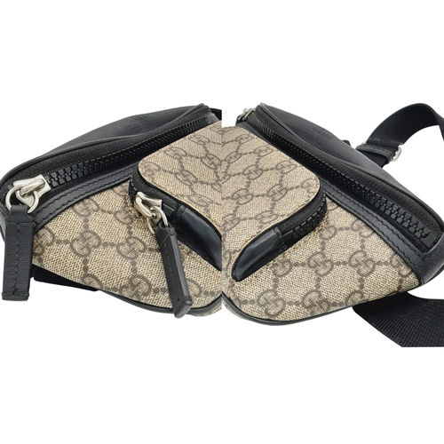 349 - A Gucci GG Supreme Eden Belt Bag. Grey GG monogram leather exterior with black leather trim and silv... 