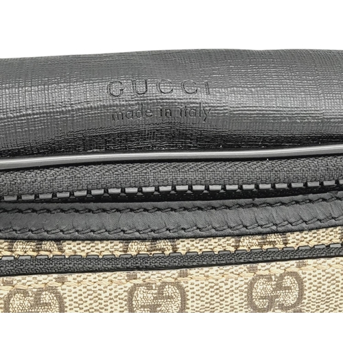 349 - A Gucci GG Supreme Eden Belt Bag. Grey GG monogram leather exterior with black leather trim and silv... 