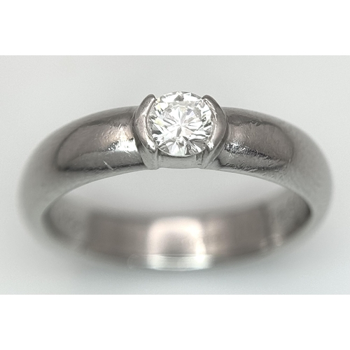 352 - A Tiffany 950 Platinum Diamond Solitaire Ring. 0.25ct. Size I. 
6.1g. Original Tiffany packaging. Re... 